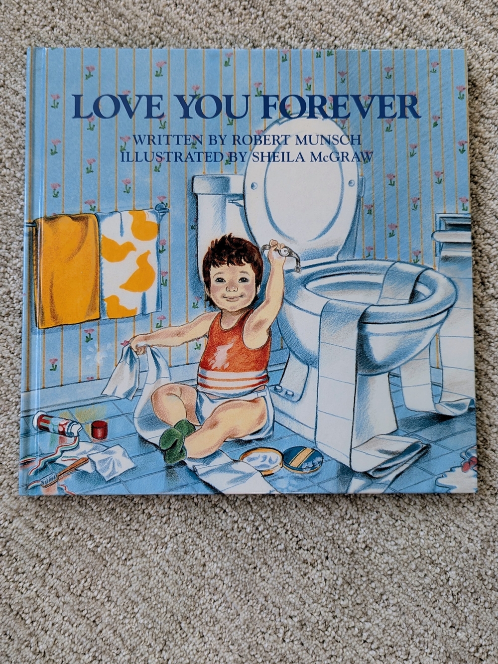 "Love You Forever" by Robert Munsch (Hardcover Picture Book)